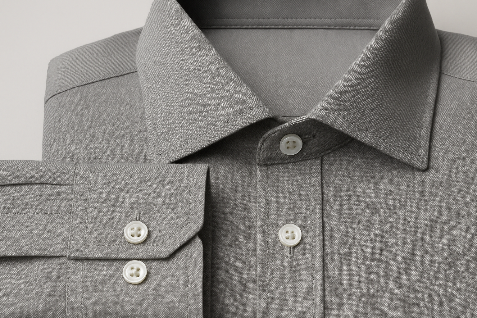 Grey dress shirt fabric detail - superior stitching quality